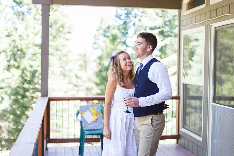 Bride and Groom on a rental cabin deck