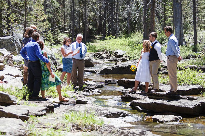 Wedding ceremony by a creek