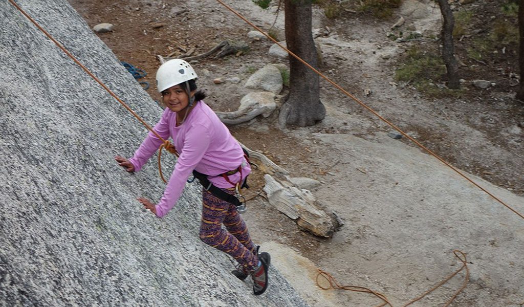 young girl learning to climb in yosemite